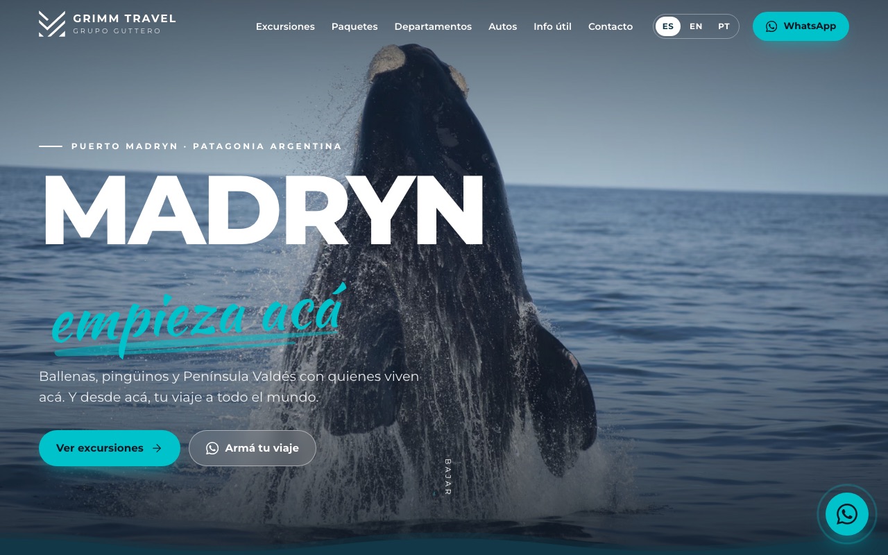Portada de grimm.com.ar en una computadora: foto de una ballena, menú con excursiones, paquetes, autos e información útil, selector de idioma y botón de WhatsApp.